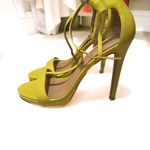 Never worn. Just tried on around the house. 
Women’s GUESS neon green heels.